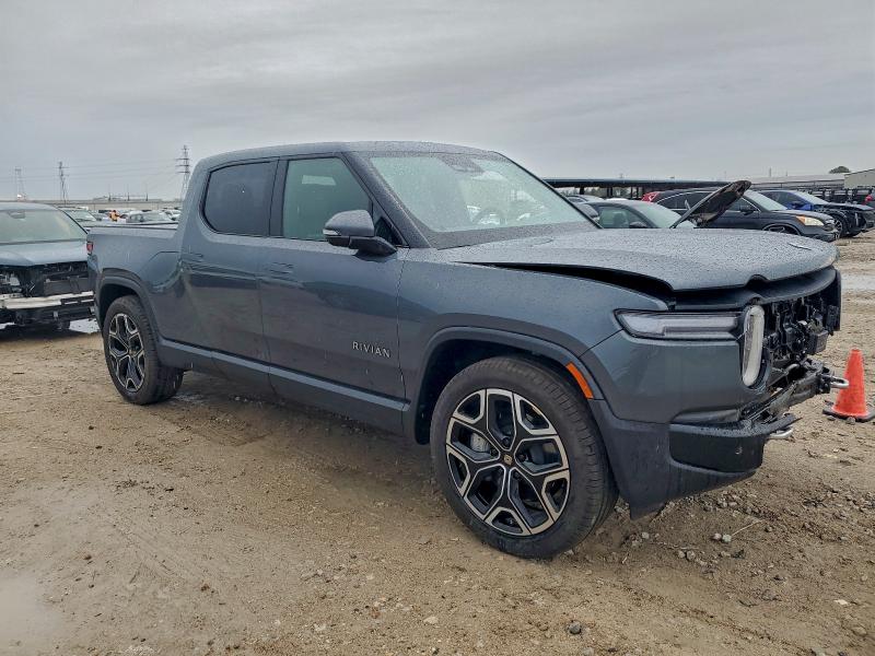RIVIAN RIT 2025 VIN 7FCTGBAA7SN041690