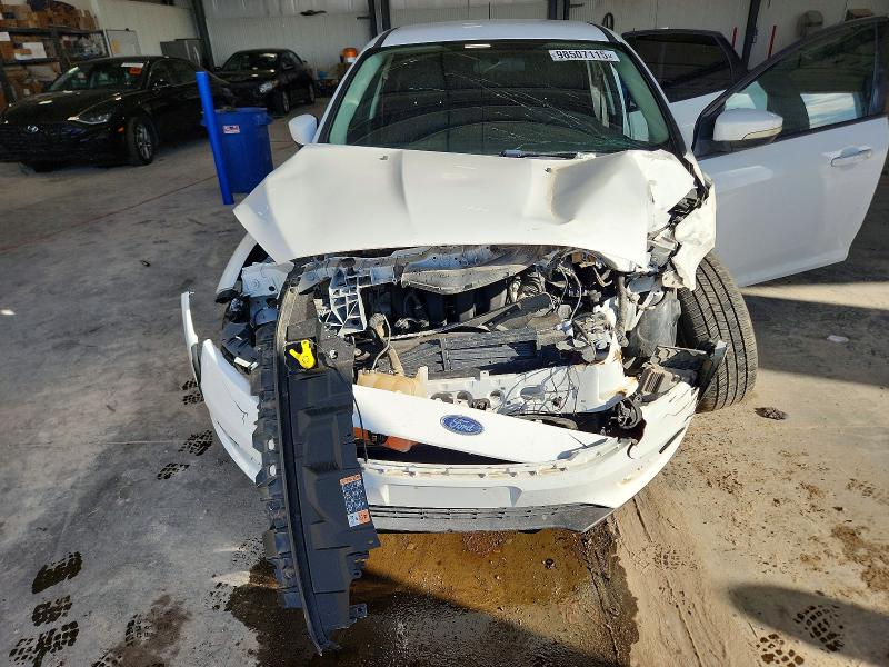 Фото 11 - FORD FOCUS