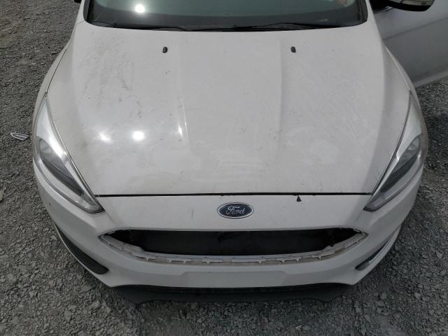 Фото 11 - FORD FOCUS