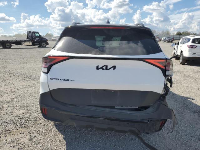 Фото 6 - KIA SPORTAGE X