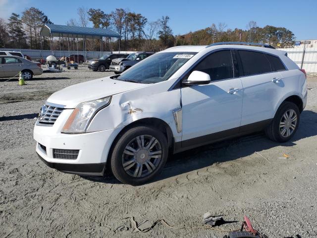 CADILLAC SRX 2015 VIN 3GYFNBE39FS601624