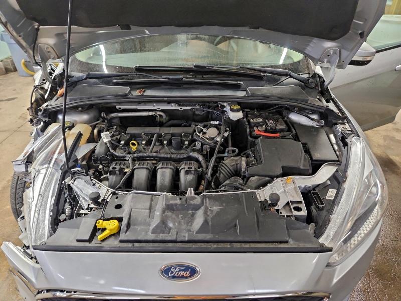 Фото 11 - FORD FOCUS