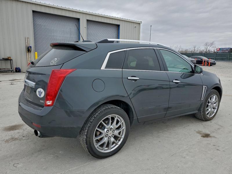 CADILLAC SRX 2015 VIN 3GYFNBE32FS555599