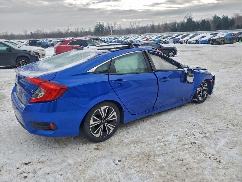 HONDA CIVIC 2018 VIN 19XFC1E37JE002735