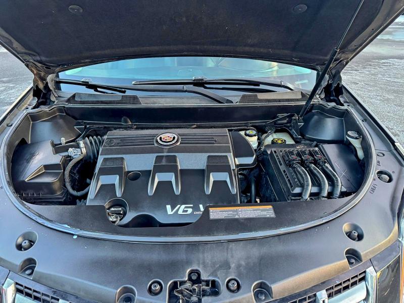 CADILLAC SRX 2015 VIN 3GYFNBE31FS623956